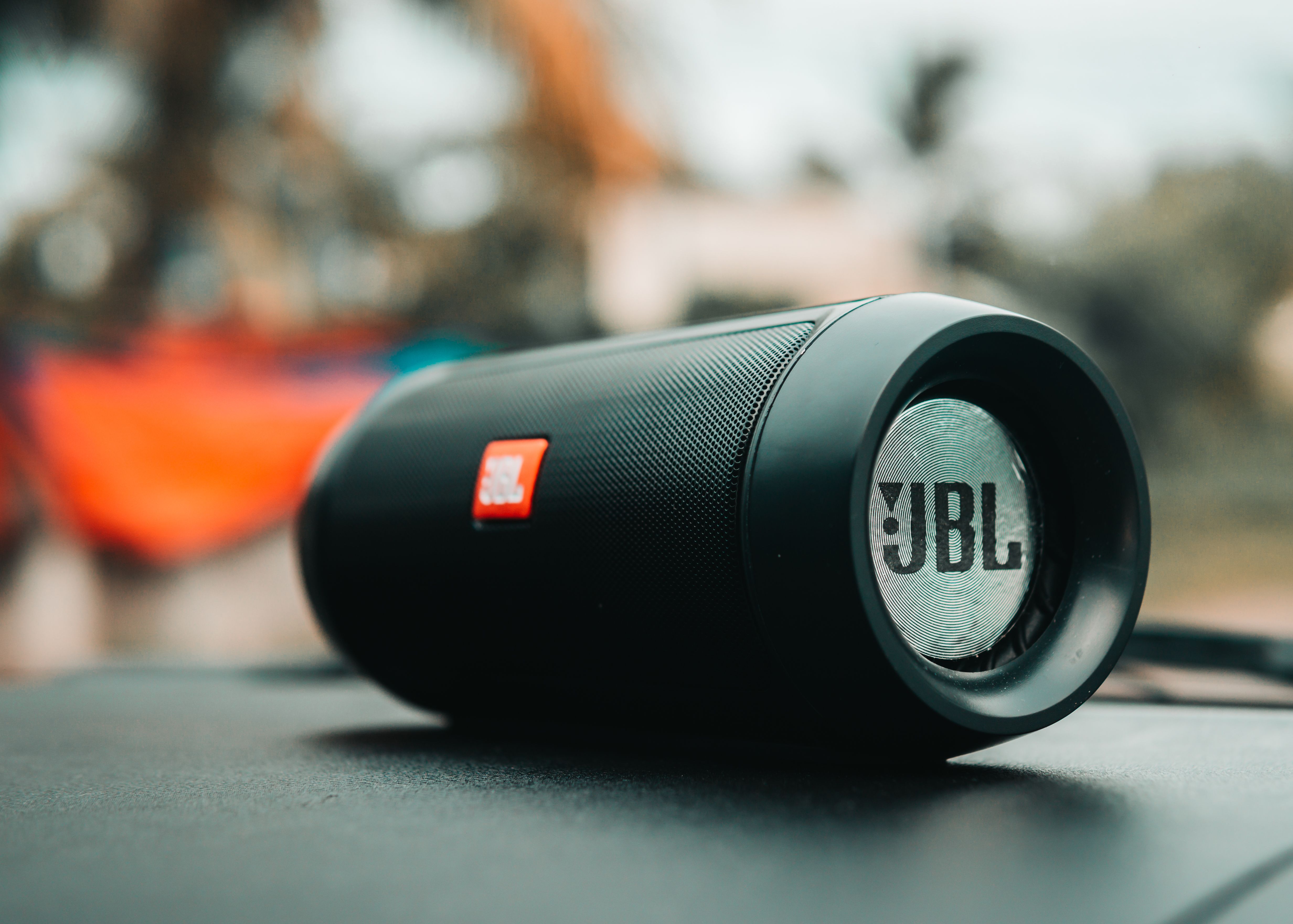 Portable Bluetooth speaker on a dark surface