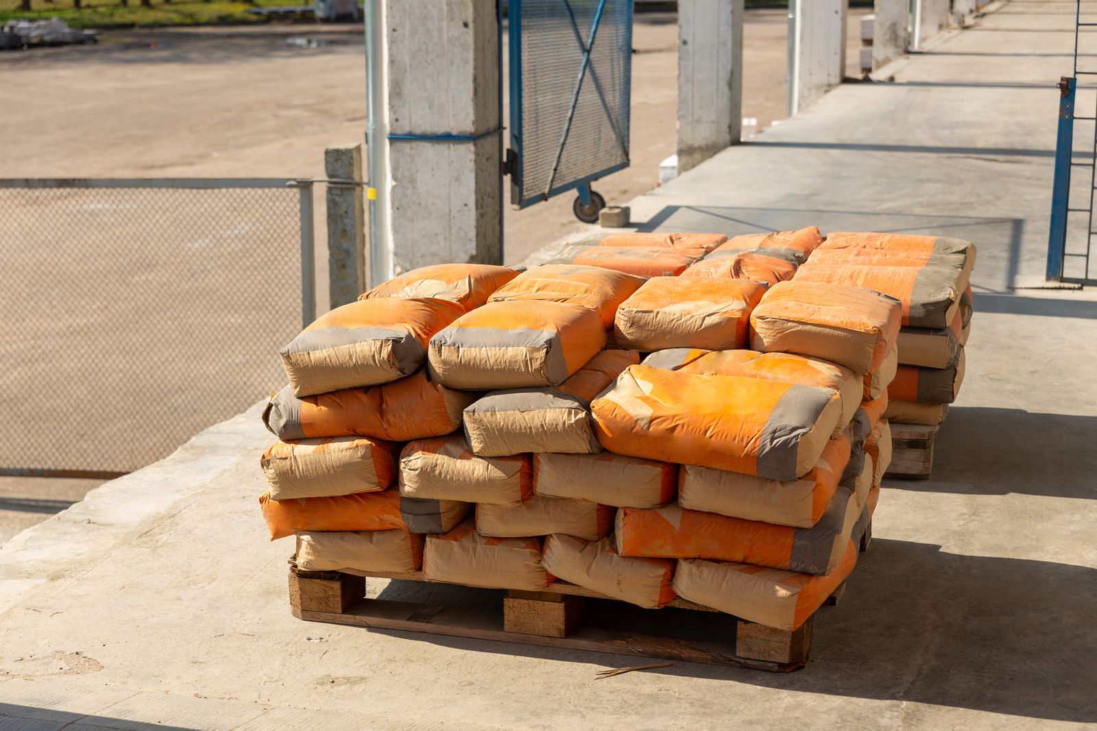 Stack of clay bricks on a pallet at a building site