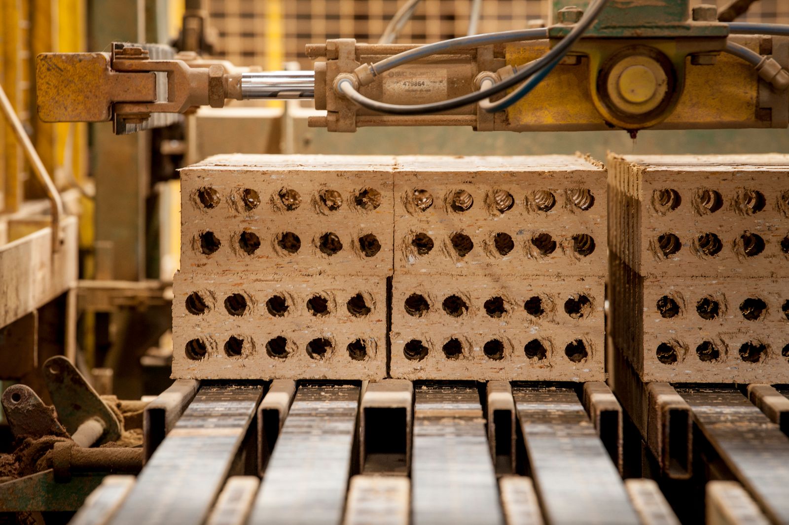 Stacks of hollow clay blocks in a production plant