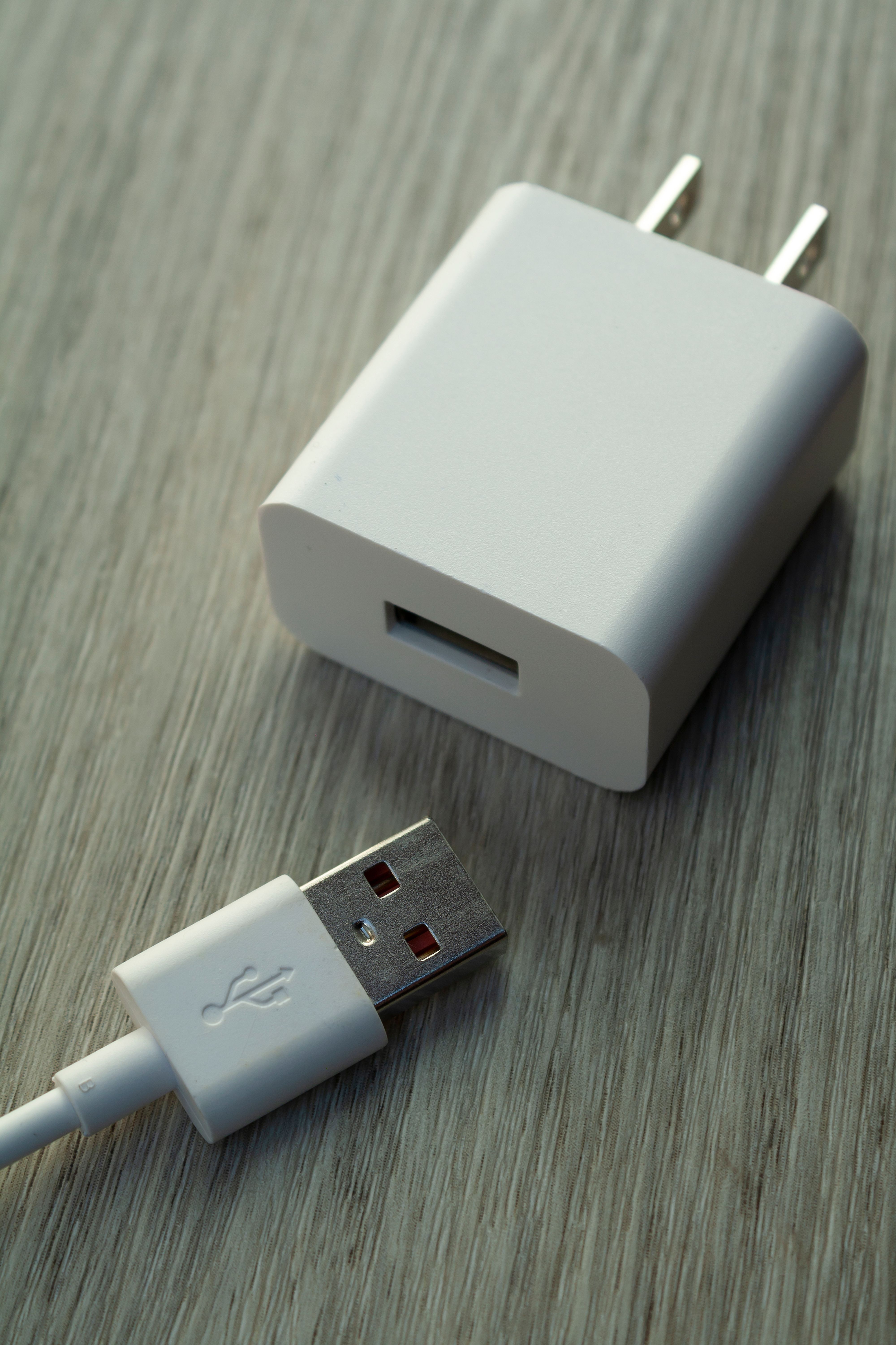 USB charging adapter with a charging cable