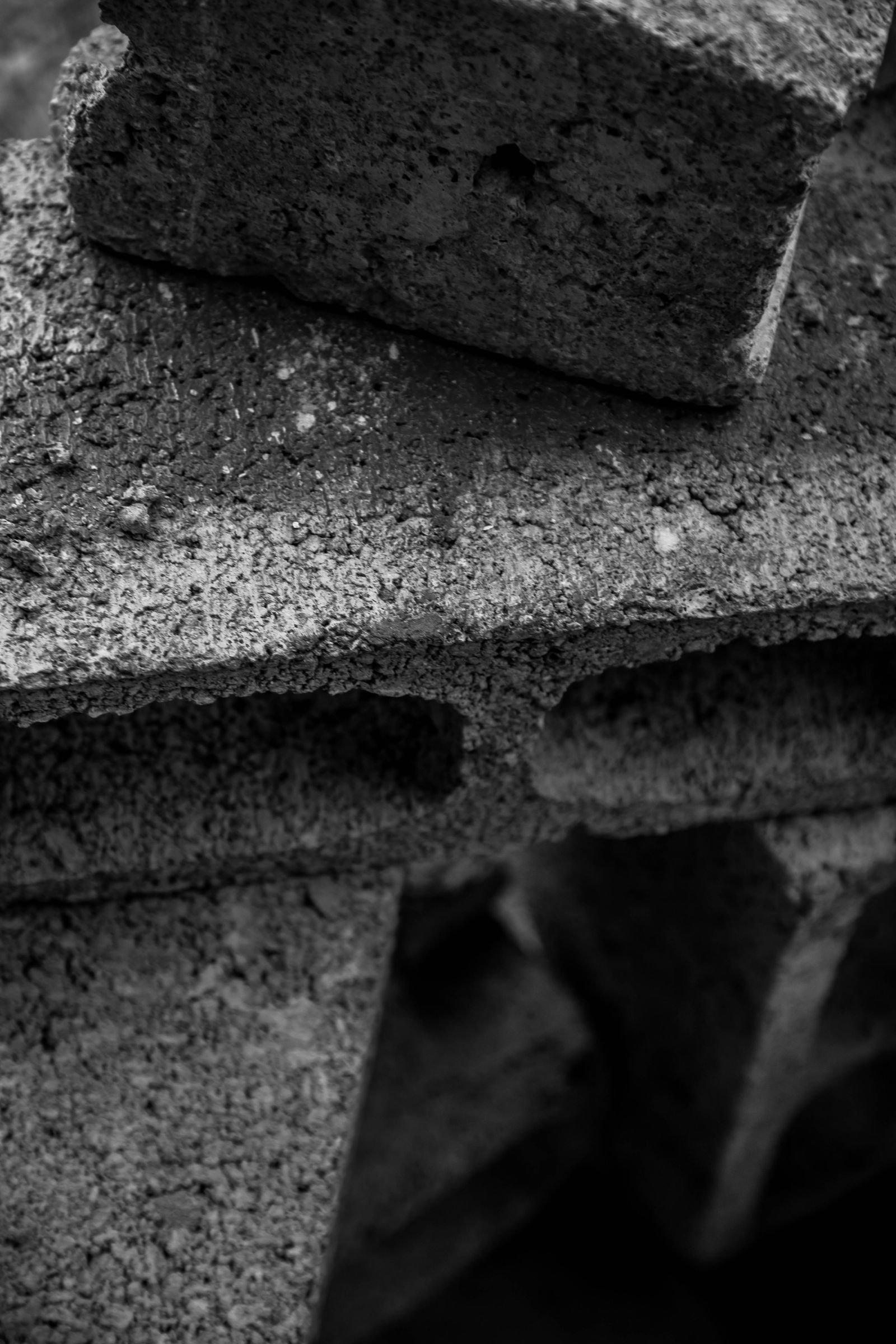 Close-up of concrete blocks photographed in black and white