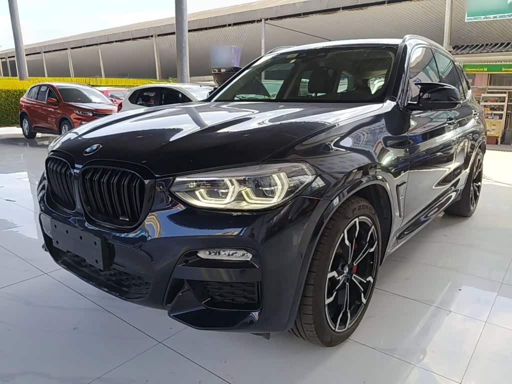 Used BMW X3 SUV in dark blue, front three-quarter view