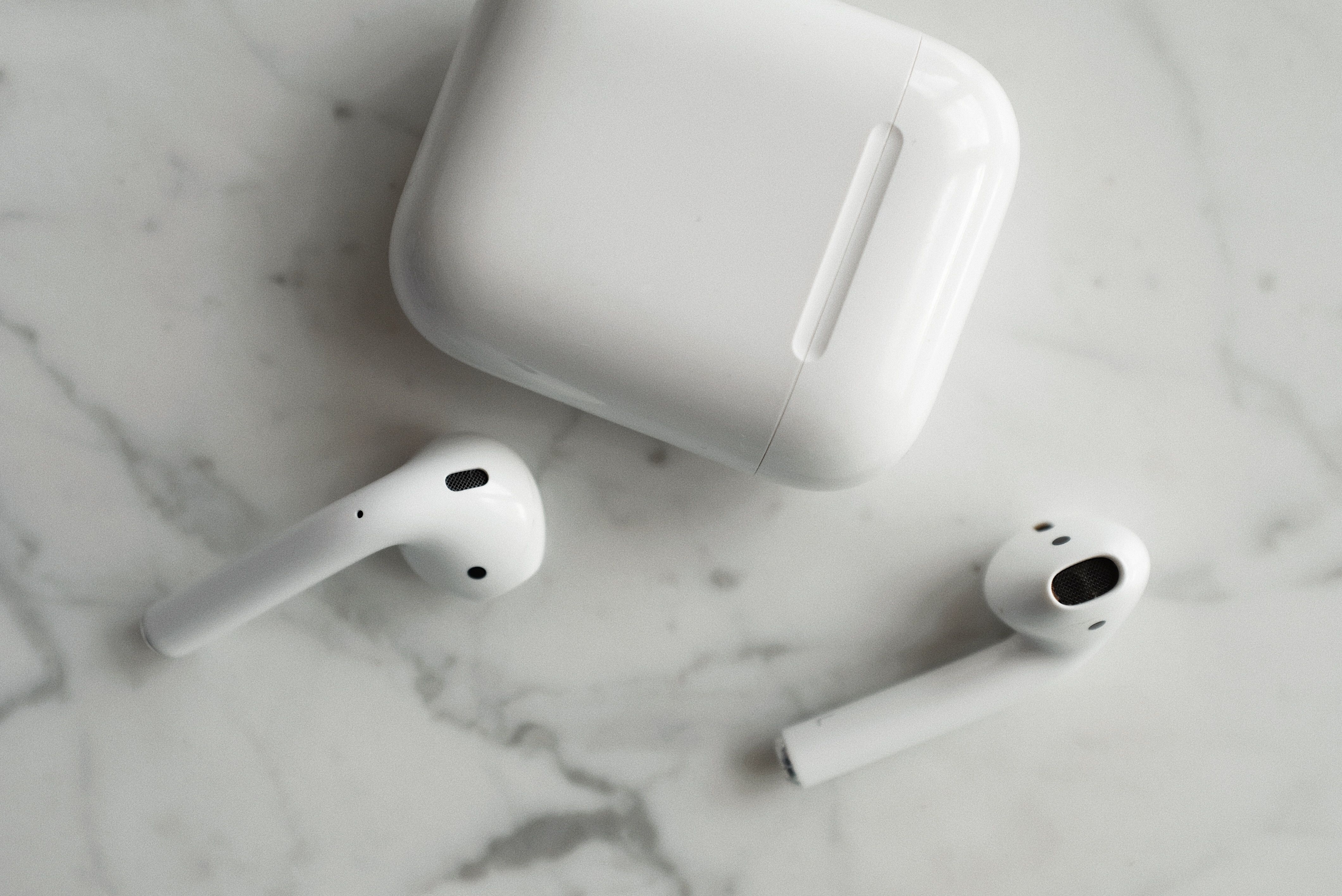 Wireless earbuds with their charging case